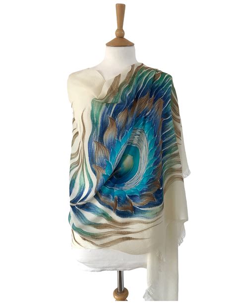 cashmere poncho with peacock feathers.